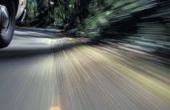 Car Speeding Down the Road