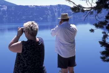 Tourists Photographing a Lake