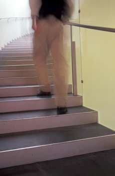 Person Walking Up Stairs