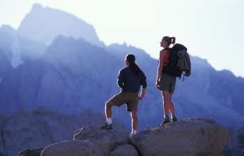 Man and Woman Hiking Together