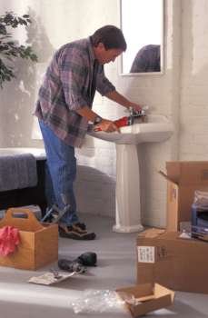 Man Installing a Sink