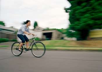 Woman Cruising on Bike