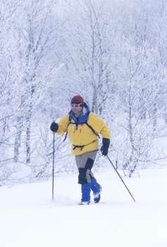 Man Cross Country Skiing