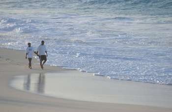 Couple on beach in Bahamas
