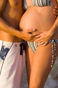 Pregnant Couple Embracing