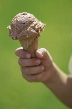 Person holding an ice cream cone