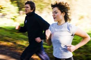 Young couple jogging in a park