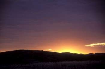 Sunrise over the hills and grasslands of the Damarland region of Namibia, Africa