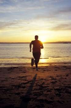 Man running on a beach
