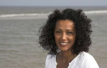 Beautiful black woman by the seaside