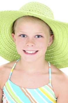 Beautiful Young Girl In Green Beach Hat. Beautiful blue eyes and a big smile.