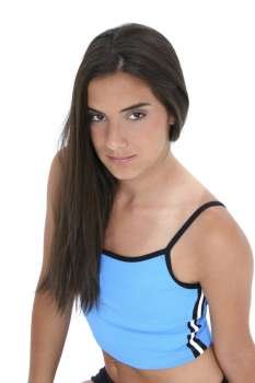 Beautiful dark haired tan teen girl in workout clothes over white. 