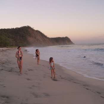 People standing on the beach in Costa Rica