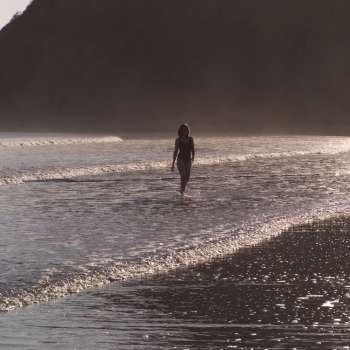 Female walking in the water in Costa Rica