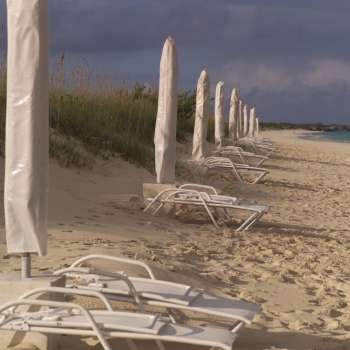 Lounge chairs on Parrot Cay beach