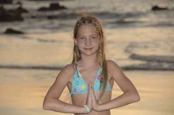 Blonde girl posing on beach