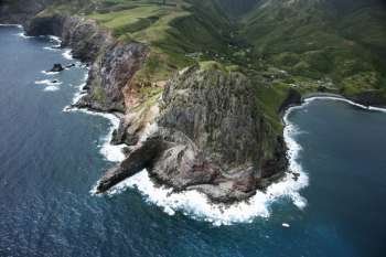 Aerial view of rocky cliffs on Maui, Hawaii coastline.
