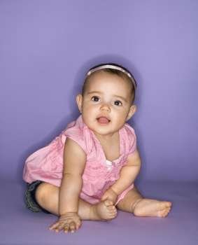 Hispanic female baby portrait.