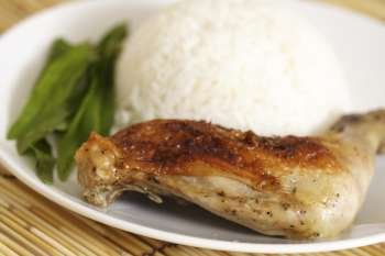 Chicken rice on a white plate