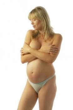 A stock photo of a pregnant woman