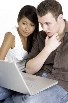 Young Couple With Laptop