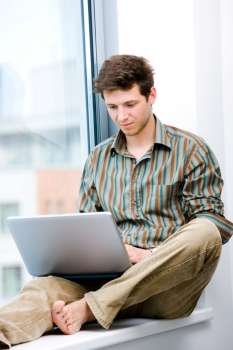 Young man on a laptop