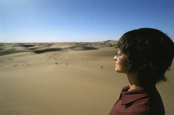 Woman outdoors standing in desert