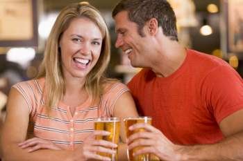 Couple having beer together