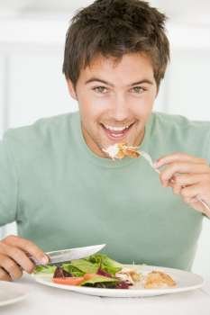 Young Man Enjoying Healthy meal,mealtime