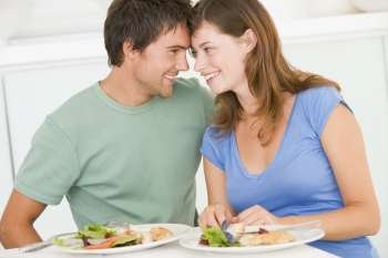 Young Couple Enjoying meal,mealtime Together