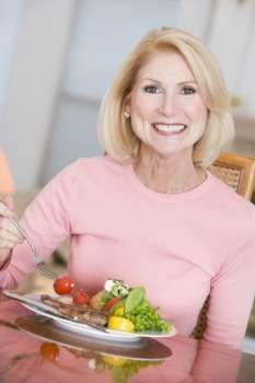 Woman Enjoying Healthy meal,mealtime