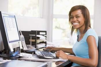 Teenage Girl Using Desktop Computer 