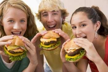 Teenagers Eating Burgers