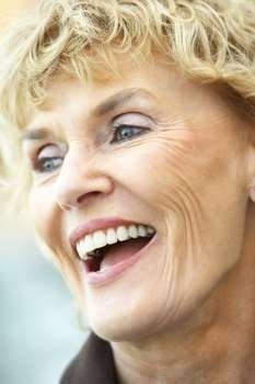 Portrait Of Senior Woman Laughing