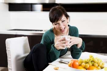 home life: woman drinking a cup of tea
