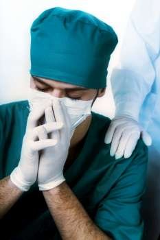 healthcare and medicine: surgeon after he failed an operation