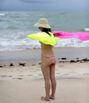 Woman enjoying on the beach, Brazil 