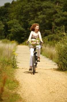 A woman riding a bike