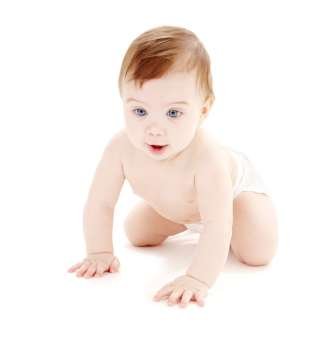 bright picture of crawling baby boy in diaper 
