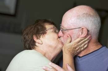 Happy Senior Adult Couple Kissing