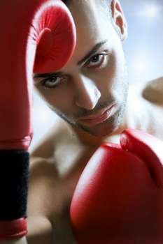 boxer in red gloves fighting 