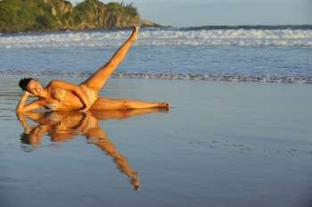 Pretty woman enjoying the beach in Buzios, Brazil 