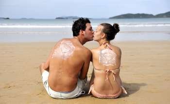 Loving couple having fun on the beach 