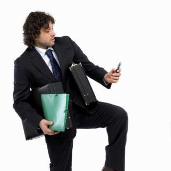 busy man with briefcase and mobilephone 