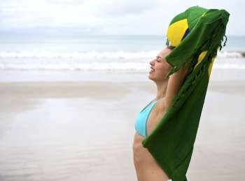 Woman enjoying the beach in Porto de Galinhas, Pernambuco, Brazil 