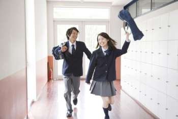 High school students walking the corridor