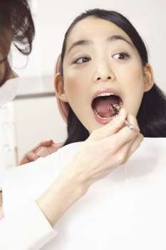 Japanese woman seeing a dentist