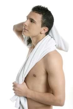 Young handsome man after bath with white towel isolated