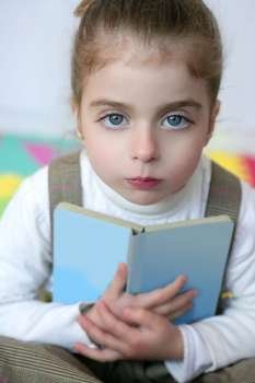 Preschooler beautiful girl, book learning numbers 