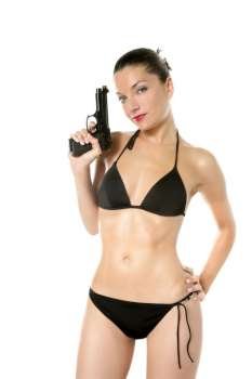 Beautiful sexy woman with black bikini and hand gun